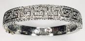 Bracelet Rigide avec un motif à la grecque serti de diamants